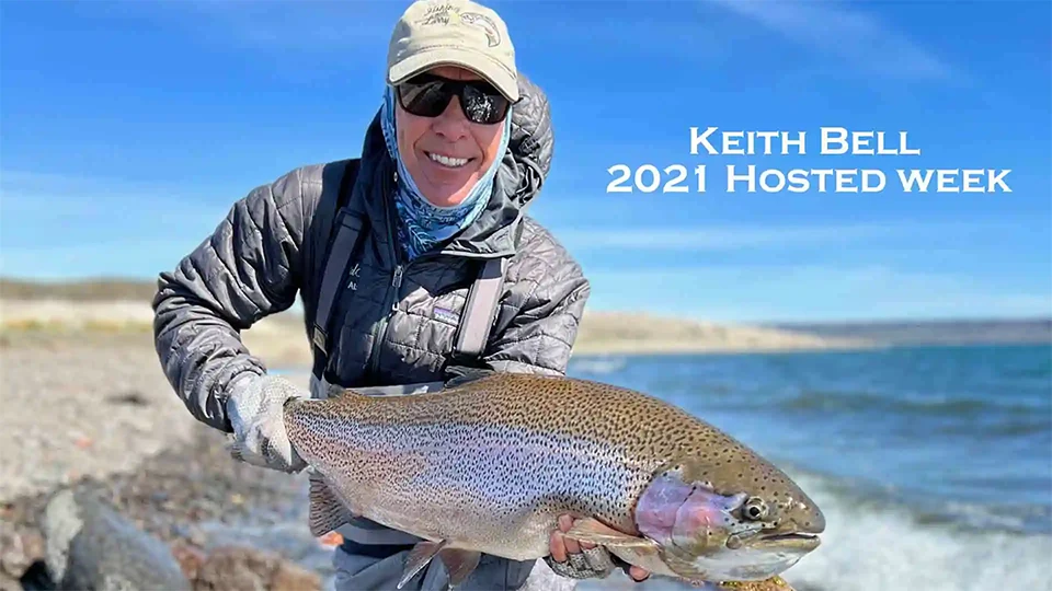 Keith Bell with a beautiful Jurassic Lake rainbow during Fishing with Larry 2021 Hosted Week.