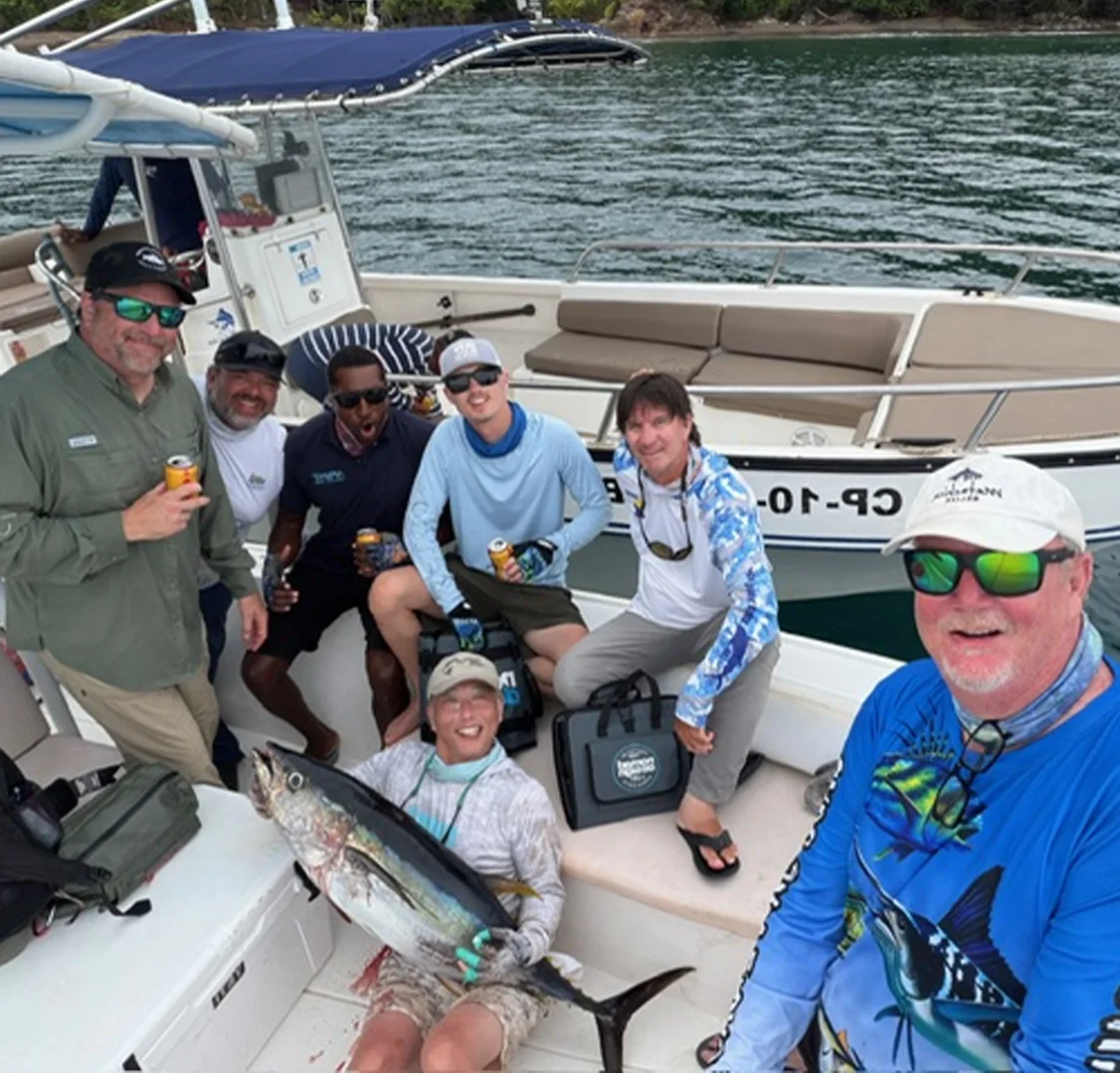 Dave with a Tuna A group shot of our 2026 hosted fishing week at Bahia Solano in Colombia with Dave holding a yellowfin tuna.