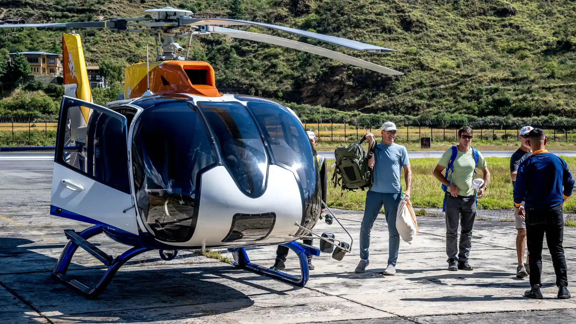 The package includes helicopter transport to and from Manas River Lodge.