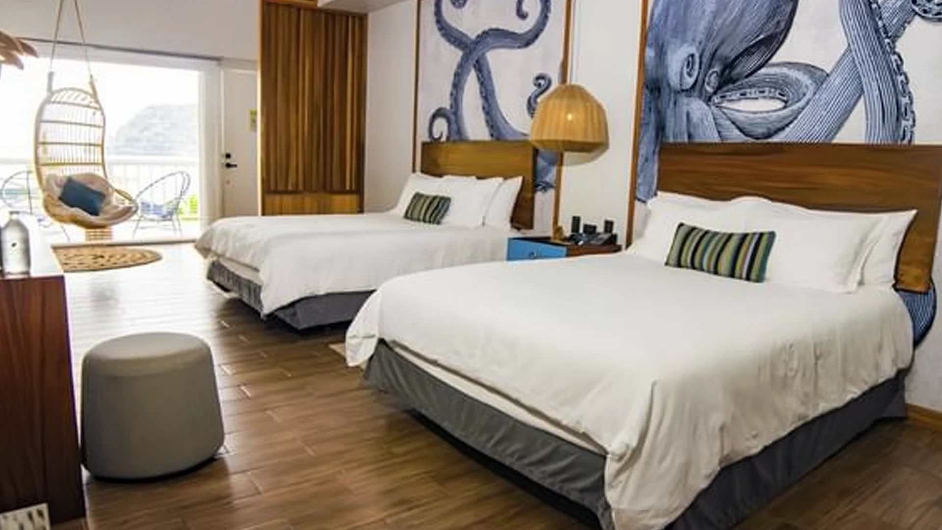 Enjoy a queen Room at the Amaka Ocean Living Lodge at Marina Bahia Golfito in Costa Rica.