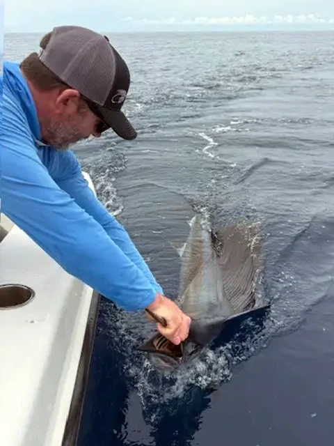 Sam Sickles at Bahia Golfito Marina in Costa Rica with his first sailfish (100+ pounds) and his first time offshore fishing.