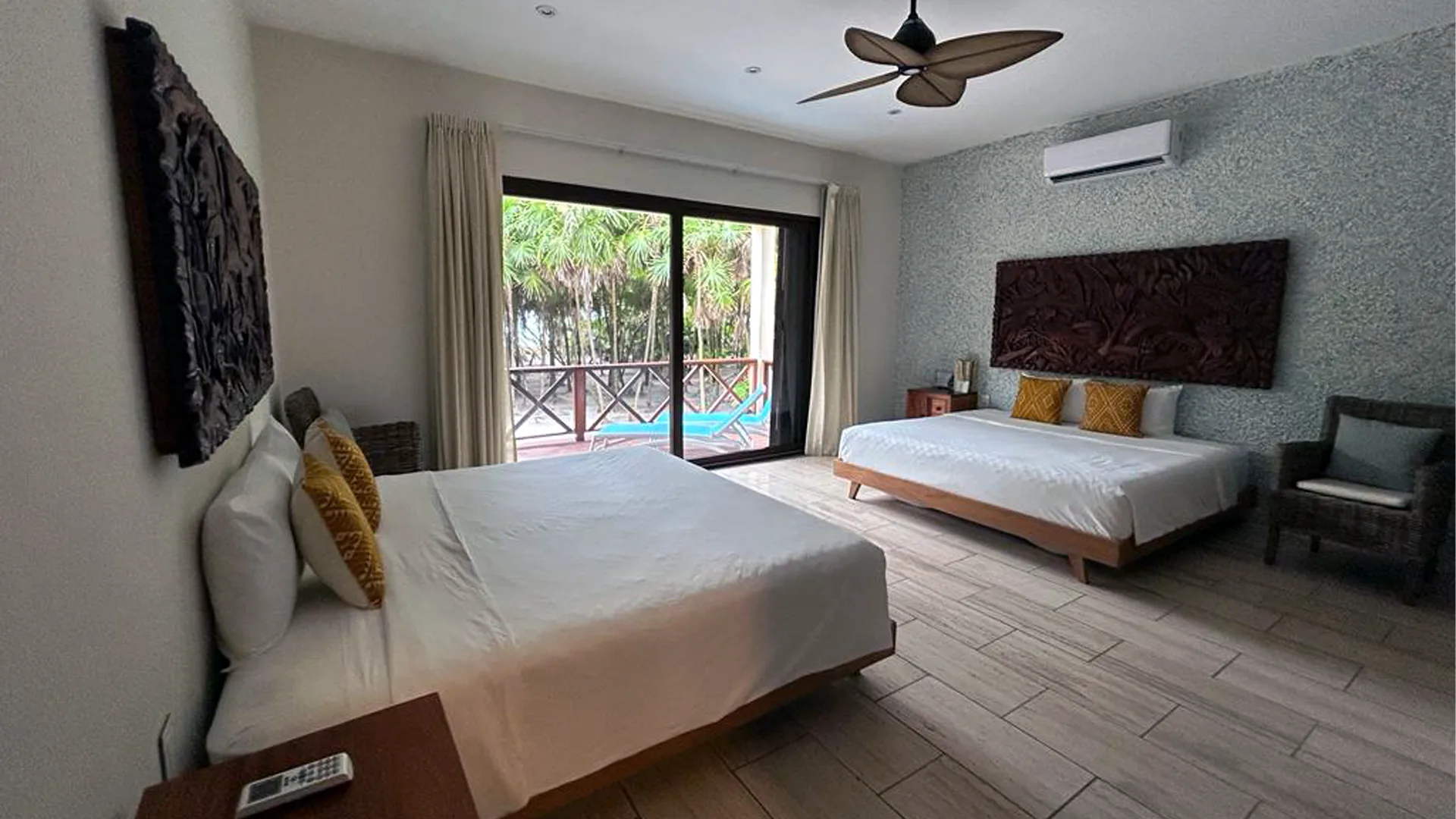 Air-conditioned bedrooms with en-suite bathrooms at the new Pesca Maya Lodge in Punta Allen.