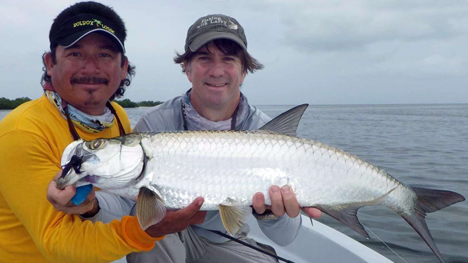 Brad Staples and guide with tarpon at Holbox Island, Mexico.